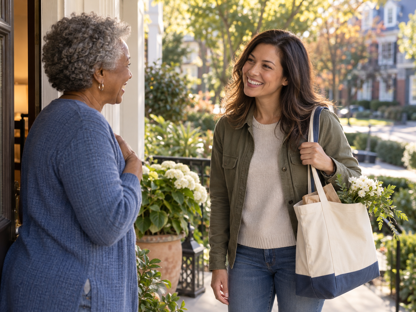 A prospective companion greeting an older adult at home